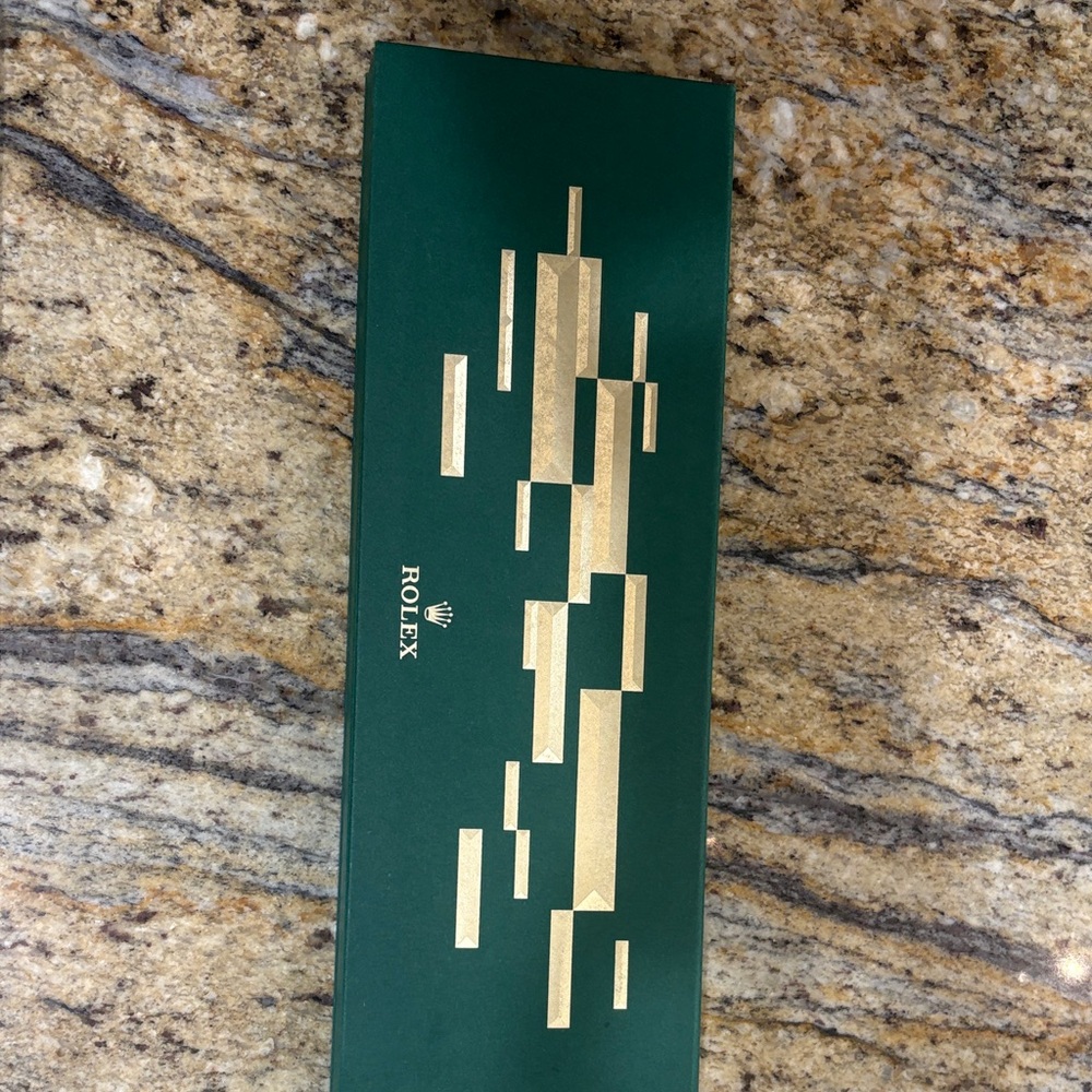 Rolex Green Box with Gold Design